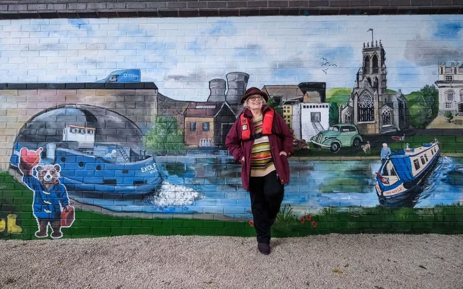 Artist Kate Rhodes with the mural. All PHOTOS: CRT