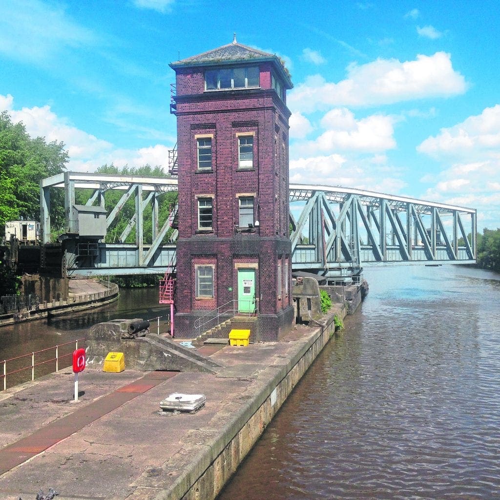 The aqueduct begins to swing, operated from a central control tower on the island.