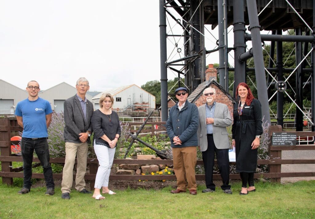 Celebrating the arrival of the historic schooner anchor at Anderton Boat Lift are (left to right) Elliot Wyatt (Canal & River Trust), Jim Mole (Chair of River Weaver Navigation Society), Lynne Foster and Nick Robinson (Neville’s children), John Tackley (President of River Weaver Navigation Society), Ani Sutton (Canal & River Trust attractions manager)