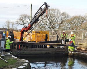 Putting stop planks in at Wheelton top lock.