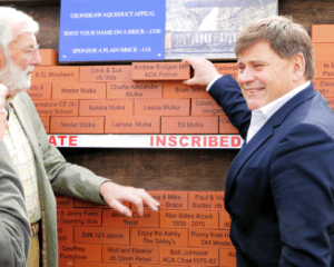 Another brick in the wall – placed by Ashby Canal Association patron Andrew Bridgen MP, right, with chairman Peter Oakden. PHOTO: ACA