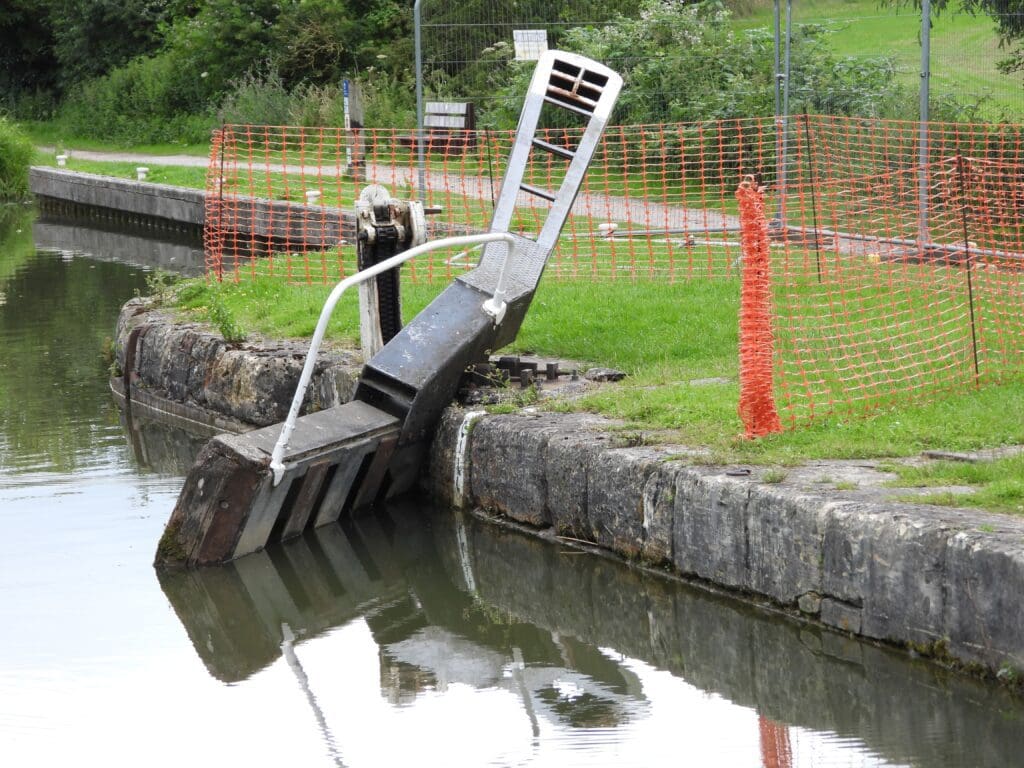 The damaged gate at Lock 24 lying at an angle following the boat damage.