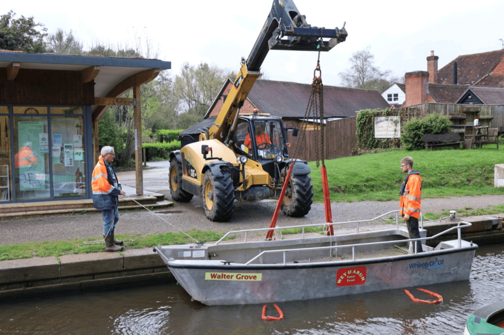 The wheelyboat is lowered into the water at Loxwood. PHOTO: JULIAN MORGAN