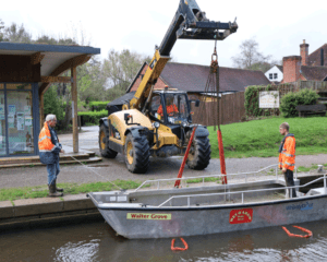 The wheelyboat is lowered into the water at Loxwood. PHOTO: JULIAN MORGAN