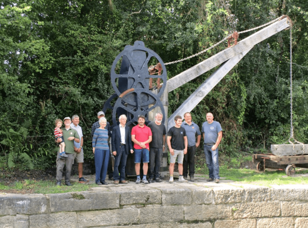 Stover Canal Trust and IWA members in front of the restored Ventiford crane.