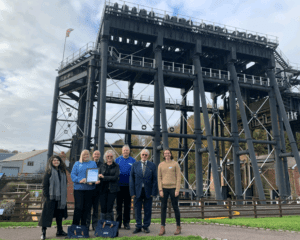 Active Waterways Cheshire volunteers were presented with national Marsh Trust volunteer awards at a special ceremony at Anderton Boat Lift. Pictured here are: Project lead Poppy Learman, Rosemary Smith, David Hall, Lynn Johnson, Malcolm Craig, Jim Robertson and project coordinator Madeline Fowler.