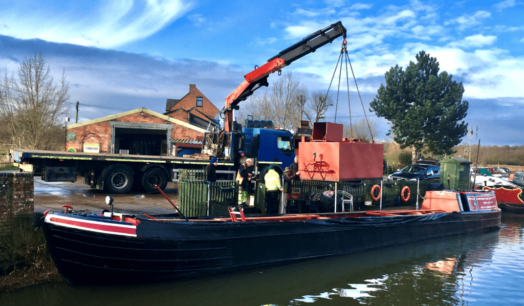 The tank is craned into Hampstead