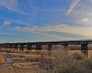 On a bright and crisp winter morning the Iron Giant stretches out across the valley of the River Erewash on the Nottinghamshire and Derbyshire border.