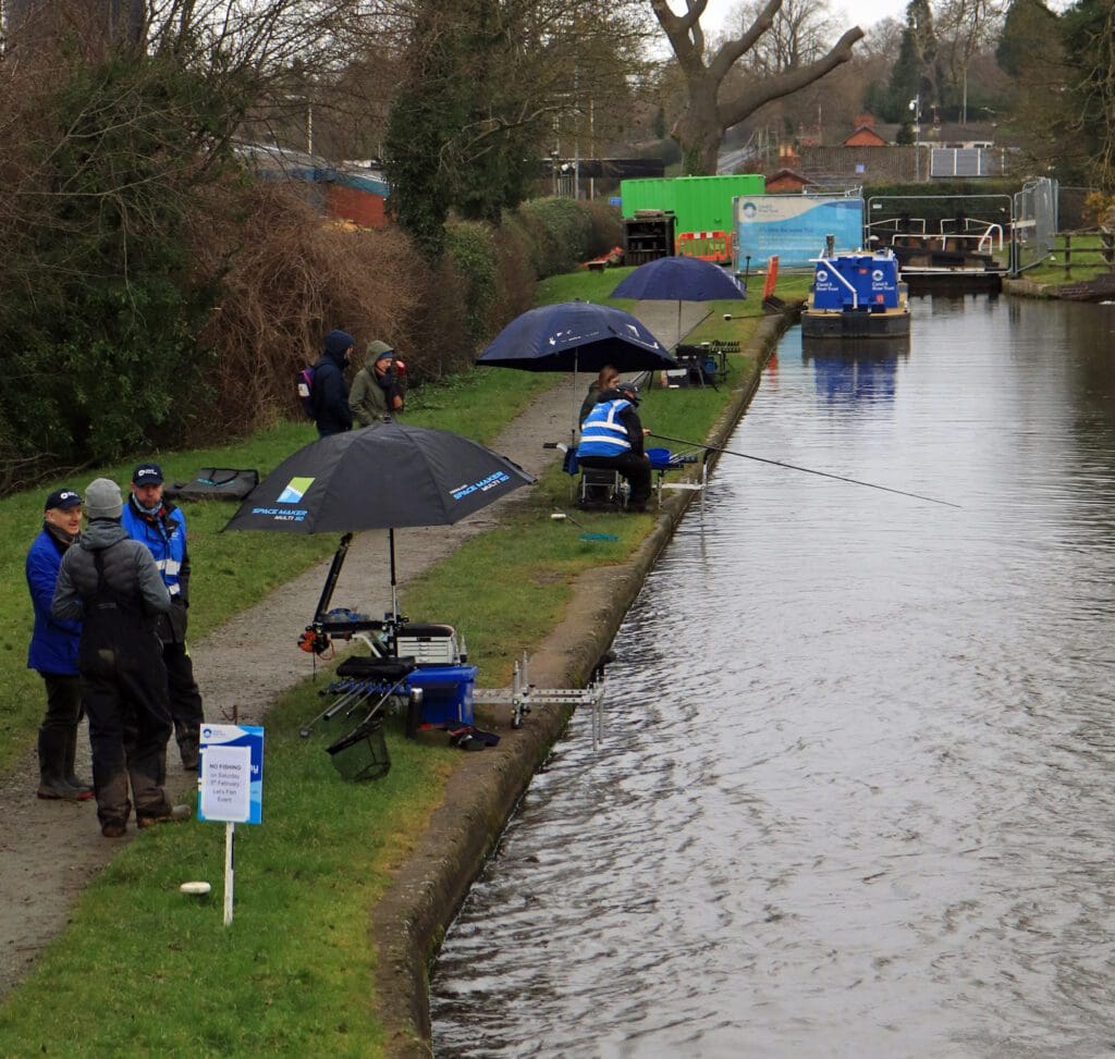 Further down the lock flight, the CRT Angling team with help from the Port Sunlight Angling Club give visitors a chance to try their hand at fishing.