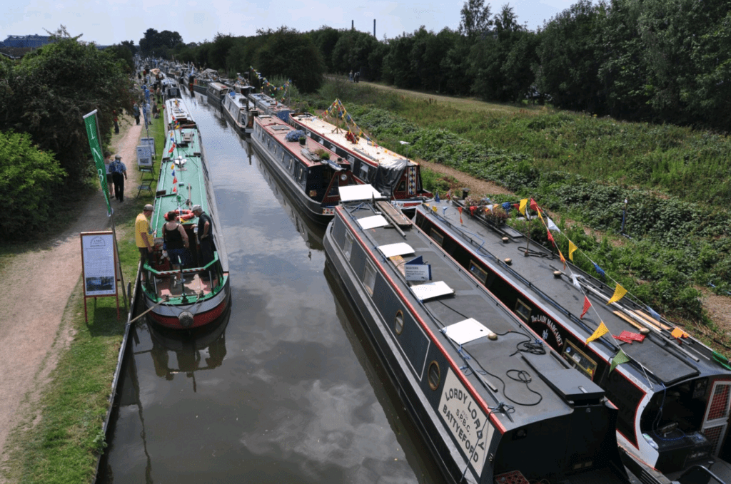 Decorated boats line the towpath at a previous Festival of Water.
