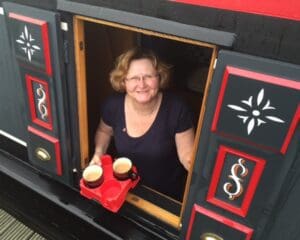 Down the hatch! Rachael Howes on board with a muggi full of drinks.