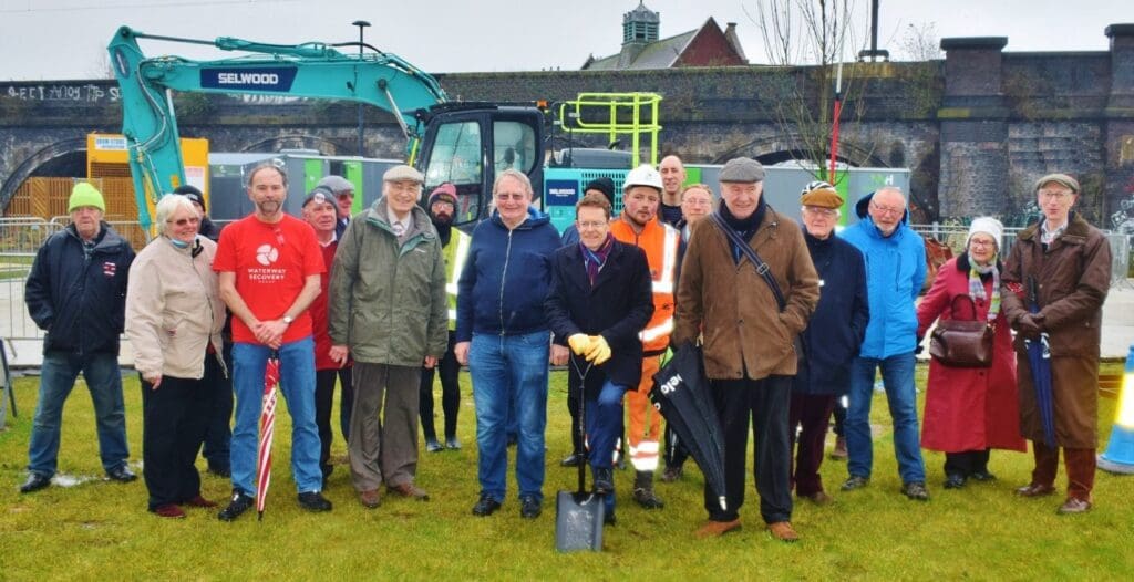 West Midlands Mayor Andy Street, centre, prepares to break the ground as work starts on the restoration of the Dudley No 2 Canal in Selly Oak.
