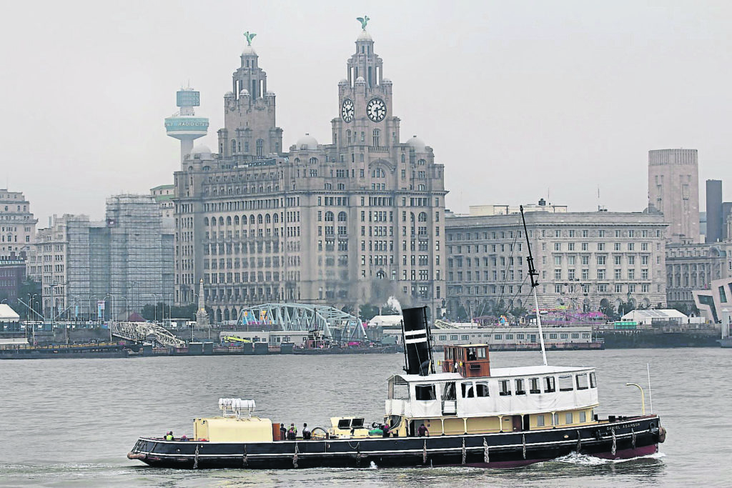 Danny on the Mersey with the Liver Building behind. PHOTO: ANDY MAHON