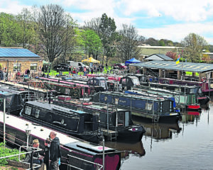 The club house and moorings of the South Pennine Boat Club in Mirfield, West Yorkshire.
