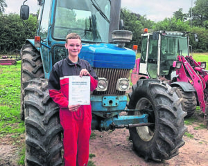 Tom Wright after gaining his tractor licence. PHOTO: LHCRT