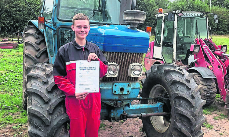Tom Wright after gaining his tractor licence. PHOTO: LHCRT