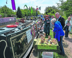 Norbury, UK . 30th, April, 2022. Crowds enjoyed warm sunny weather on the first day of the Norbury Canal Festival being held for the first time in two years due to the pandemic. © Phil Pickin/ Alamy Live News