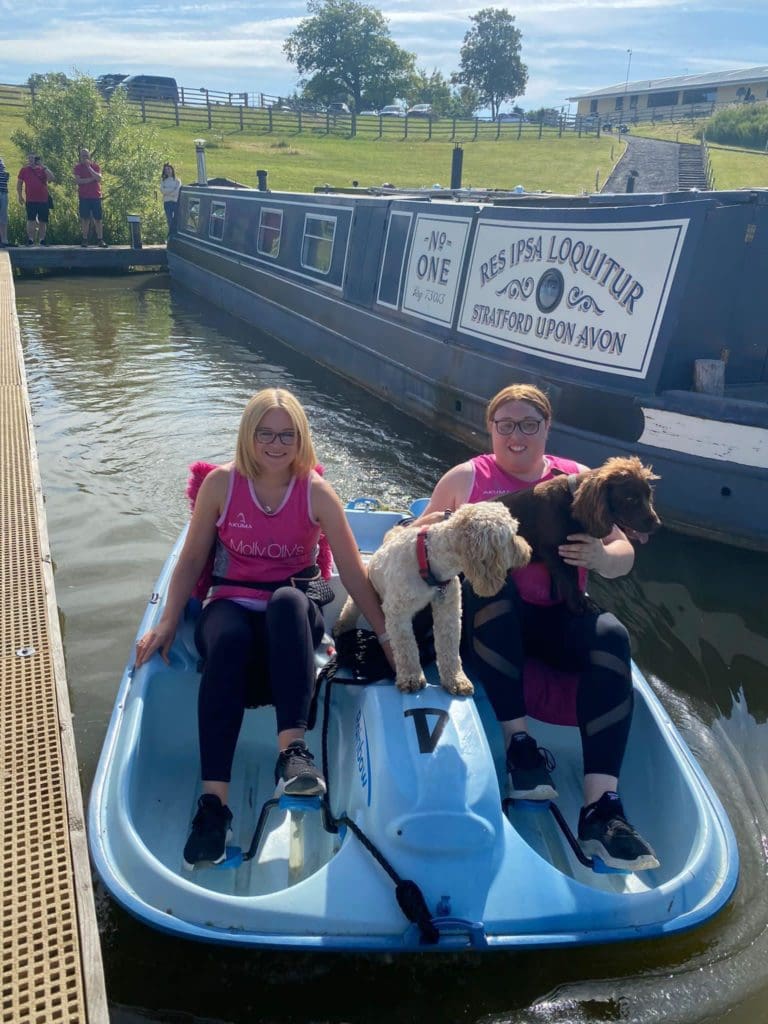 Emma Brayne and Alex Pearson with her two dogs Archie and Chester set off from Wootten Wawen.