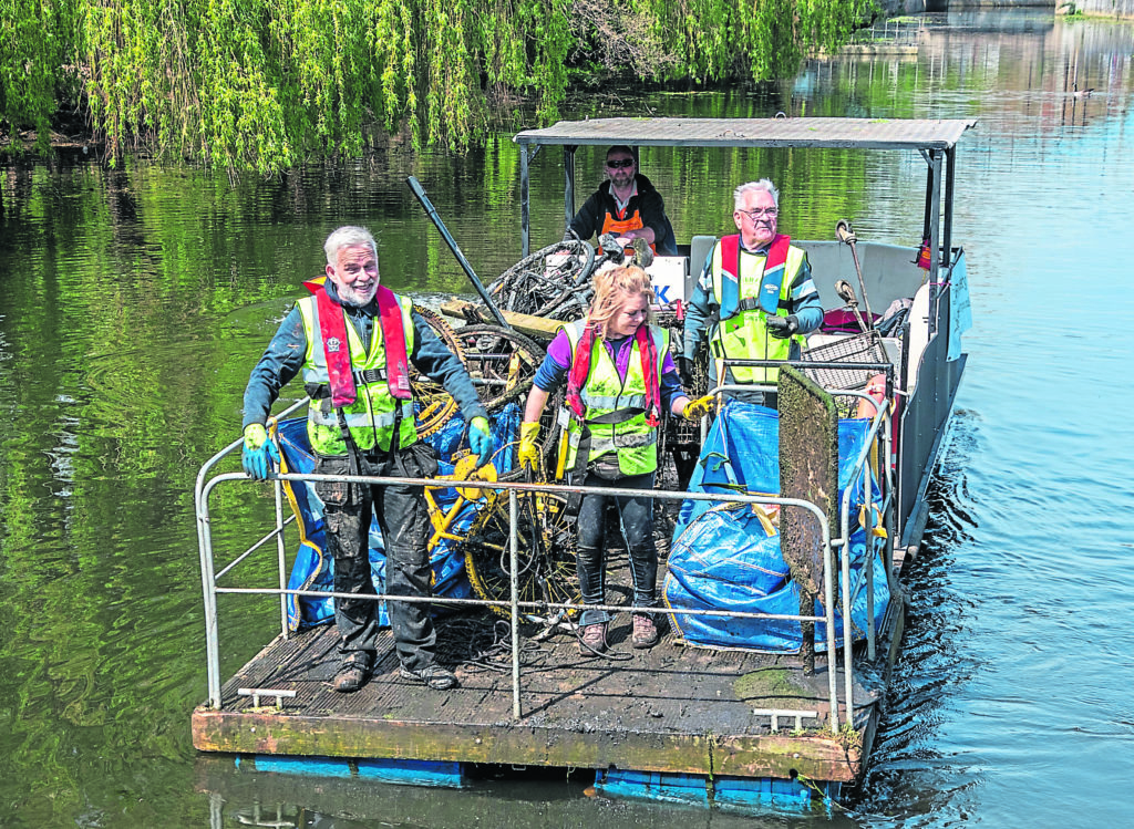 River Foss Society members Tim Rane, left, with Louise Woodall and Barry Thomas aboard Foxy, York Council’s boat which they use for litter picking. This was the first litter pick of the year during the York Walls Festival. They retrieved seven trolleys, seven bikes, a sign and many small litter bags.