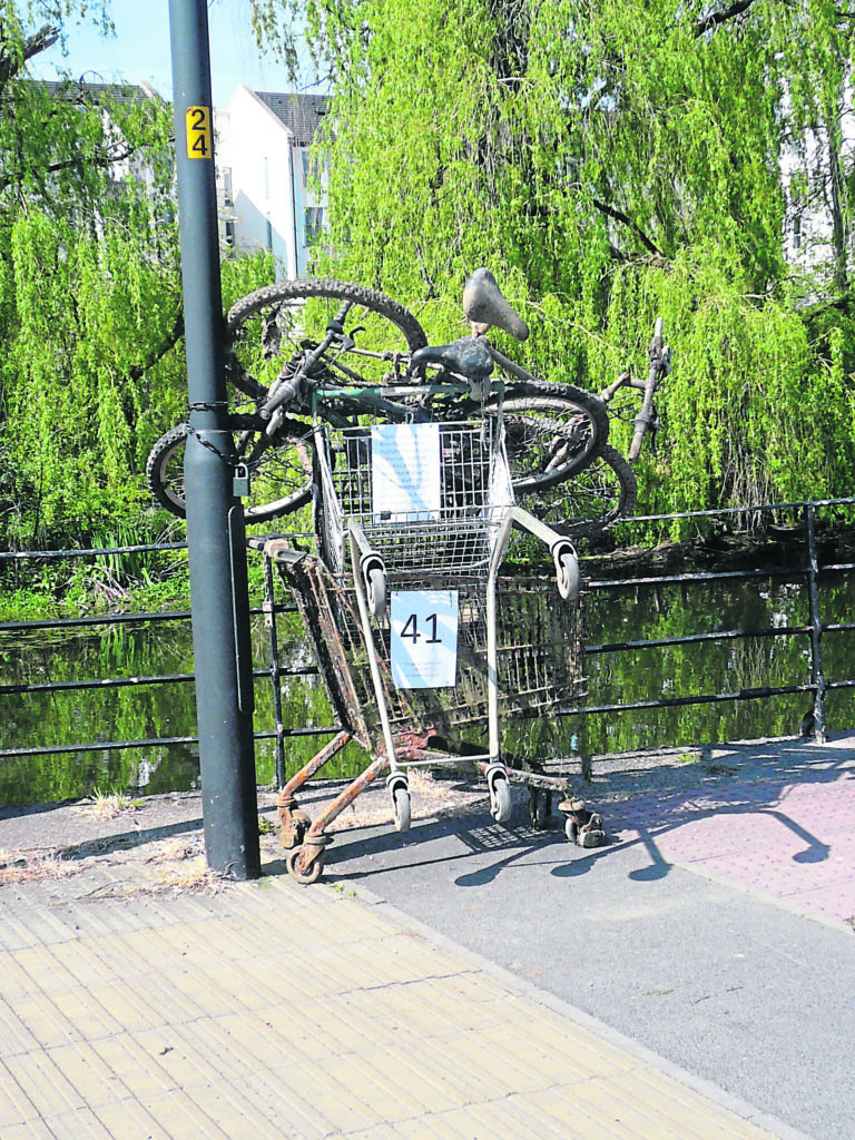 Some of the trolleys and bikes retrieved from the River Foss piled up during the York Walls Festival to demonstrate the issue.