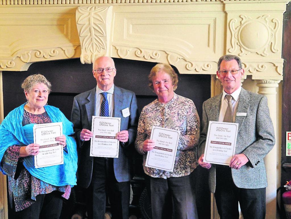 Displaying the special award are, from left:  Christine Russell, John Herson, Ann Farrall and Jim Forkin.