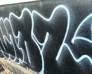 Graffiti daubed on the bridge at Lock 7. PHOTO: IWA
