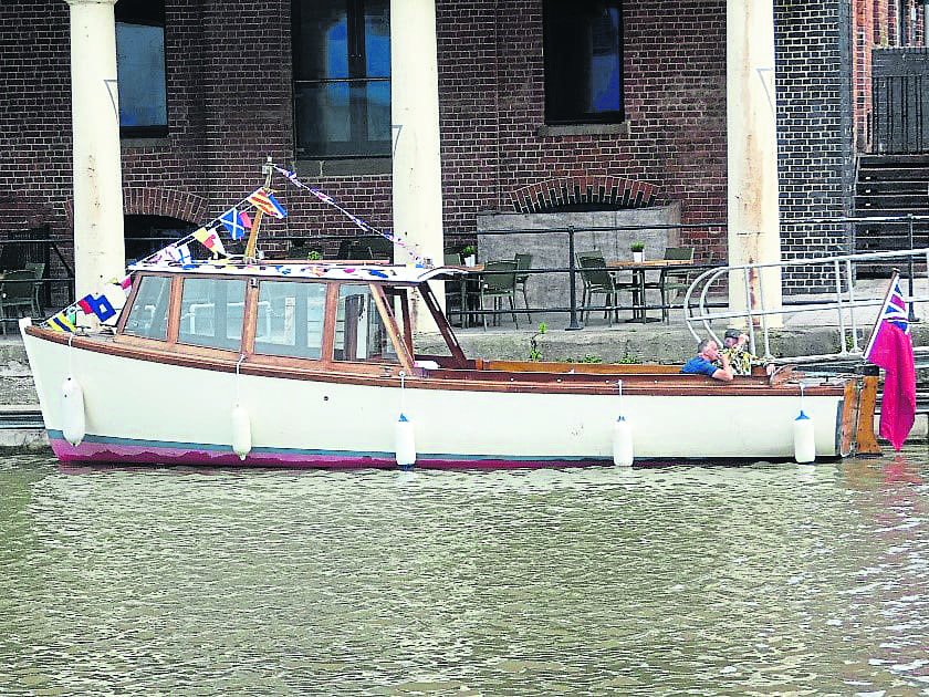 Providing boat trips from the pontoon at the front of the North Warehouse will be Still Waters. She was originally built in 1922 as a tender for the RMS Mauretania 1 (1906-1934), a sister ship to the Lusitania which was sunk by a German U-Boat in 1915. After the ship was scrapped in May 1935, Still Waters was transferred to the newly built Mauretania 2, a joint build venture by White Star Line and Cunard in 1936 and stayed until she was scrapped in 1966. In 2014 Still Waters was lifted out of the water and fully restored by Phil Goddard, a Southampton vintage boat restorer until transported to the Thames and returned to the water in July 2015. Still Waters was obtained by the Boat Station Slimbridge in 2021 and enjoys a new life as a passenger trip boat on the Gloucester & Sharpness canal.