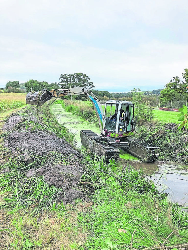 Amphibian dredging on the Tanat Feeder.  PHOTO: MARK WEATHERALL/CRT