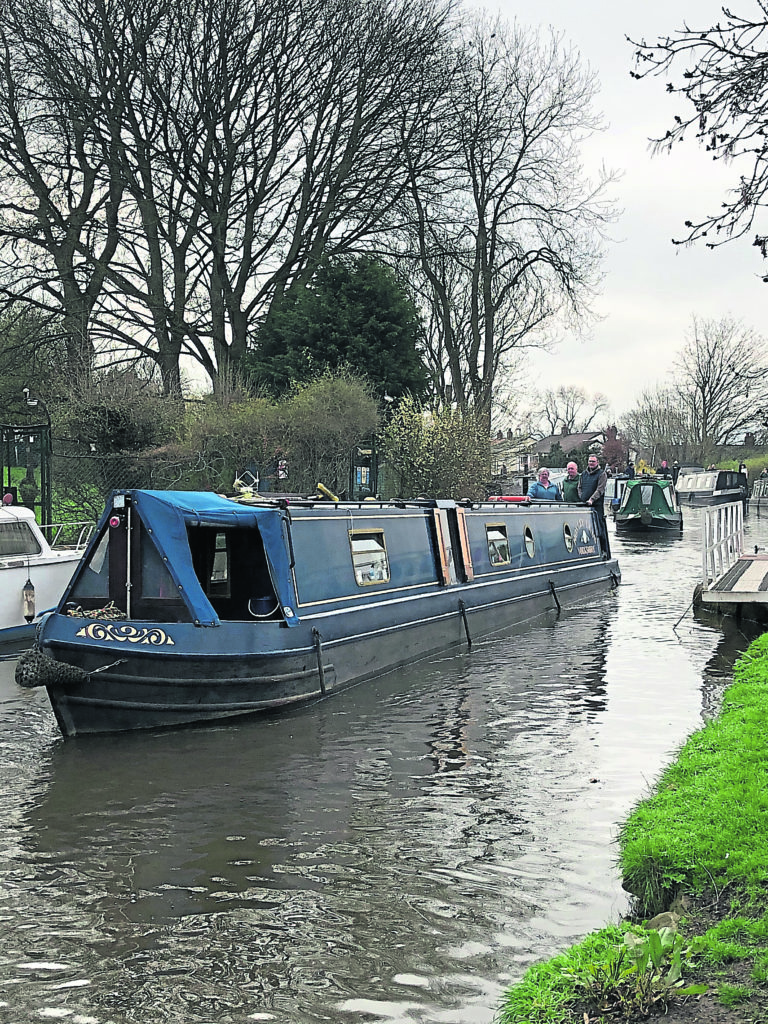 Boats followed Kennet in the flotilla from Bingley’s landmark Five Rise Locks.
