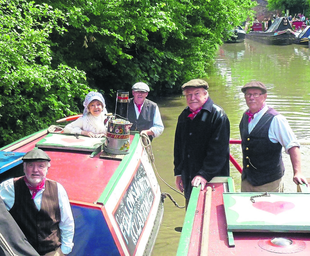 Tim and Pru and Friends of President in the Parade of Boats at the 2013 Braunston Historic Narrowboat Rally. PHOTO: TIM COGHLAN