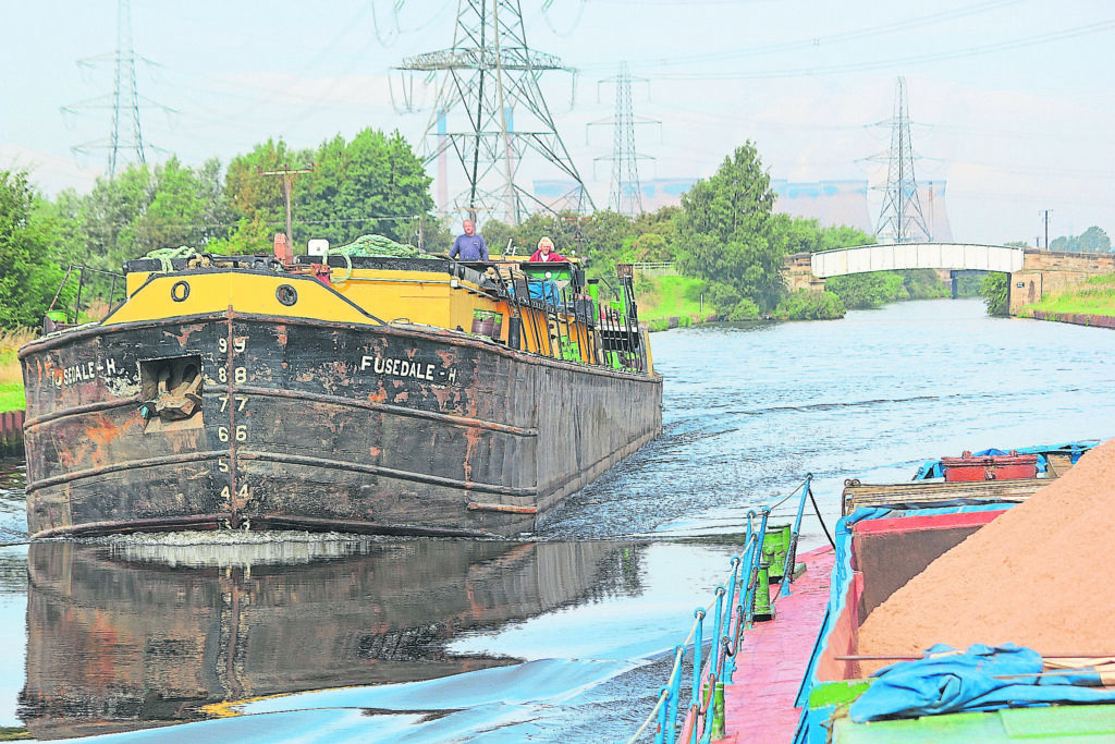 A non-stop continuous flow of aggregate traffic on the Aire & Calder Navigation in the NE.
