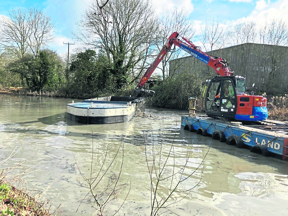 A floating digger hard at work removing sediment from the Ashby Canal in Leicestershire. PHOTO: SUPPLIED
