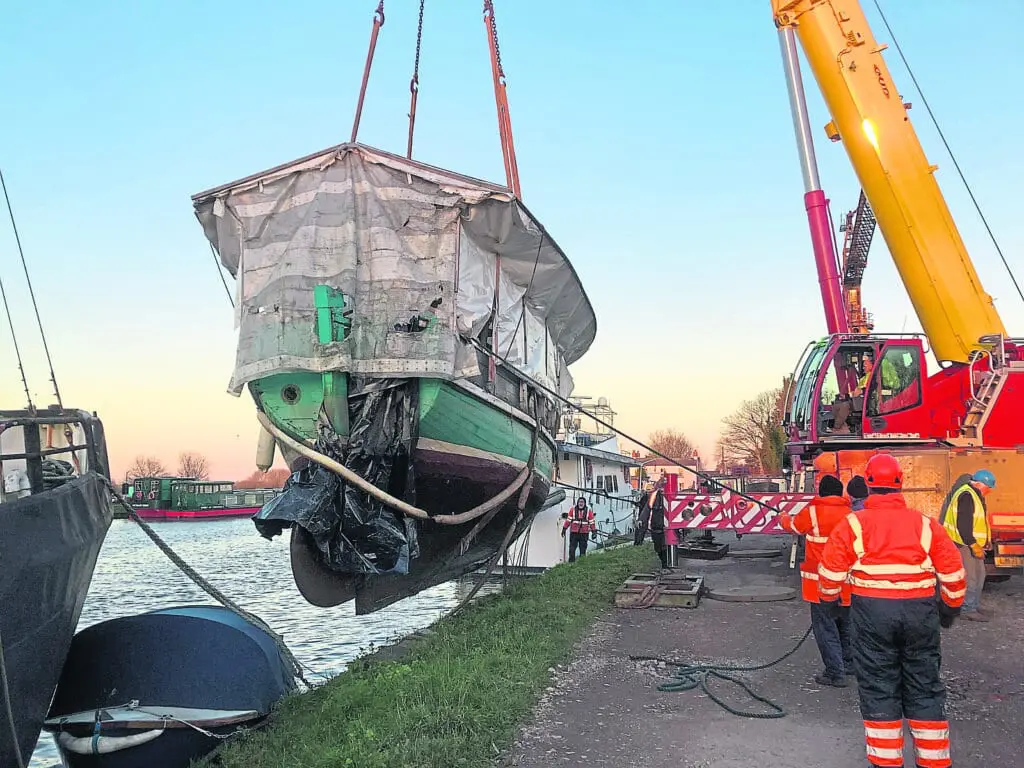 White Heather being raised from the dock. PHOTO: CRT