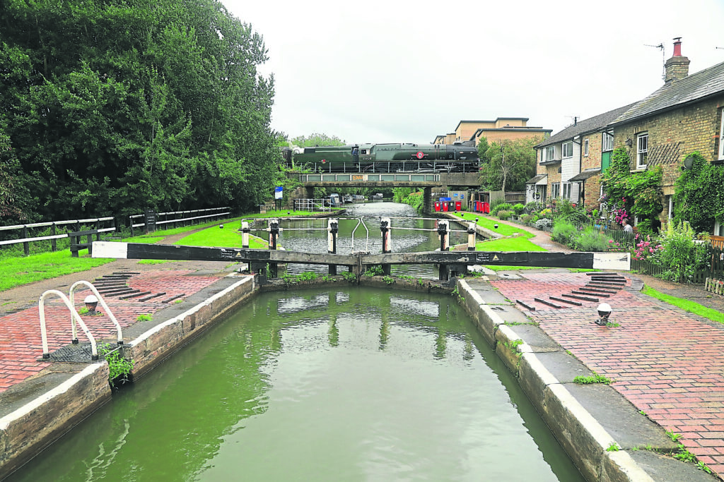 Clan Line crosses Fenny Stratford Grand Union Canal lock number 22 on August 4. The locomotive was built in 1948 at Eastleigh for British Rail but designed by the Southern Railway. BOTH PHOTOS: PHIL MARSH