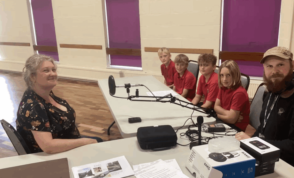 Schoolchildren ready to record.