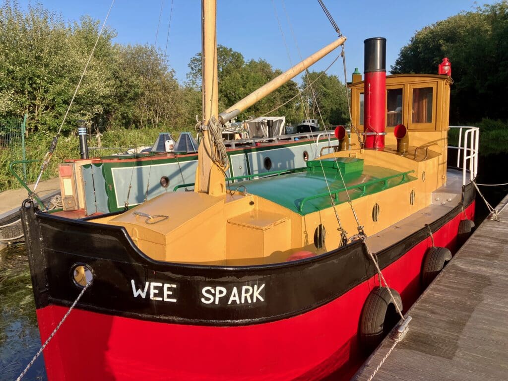 Wee Spark – a one-third scale replica of a Clyde Puffer – in all her glory in a new coat of paint.
