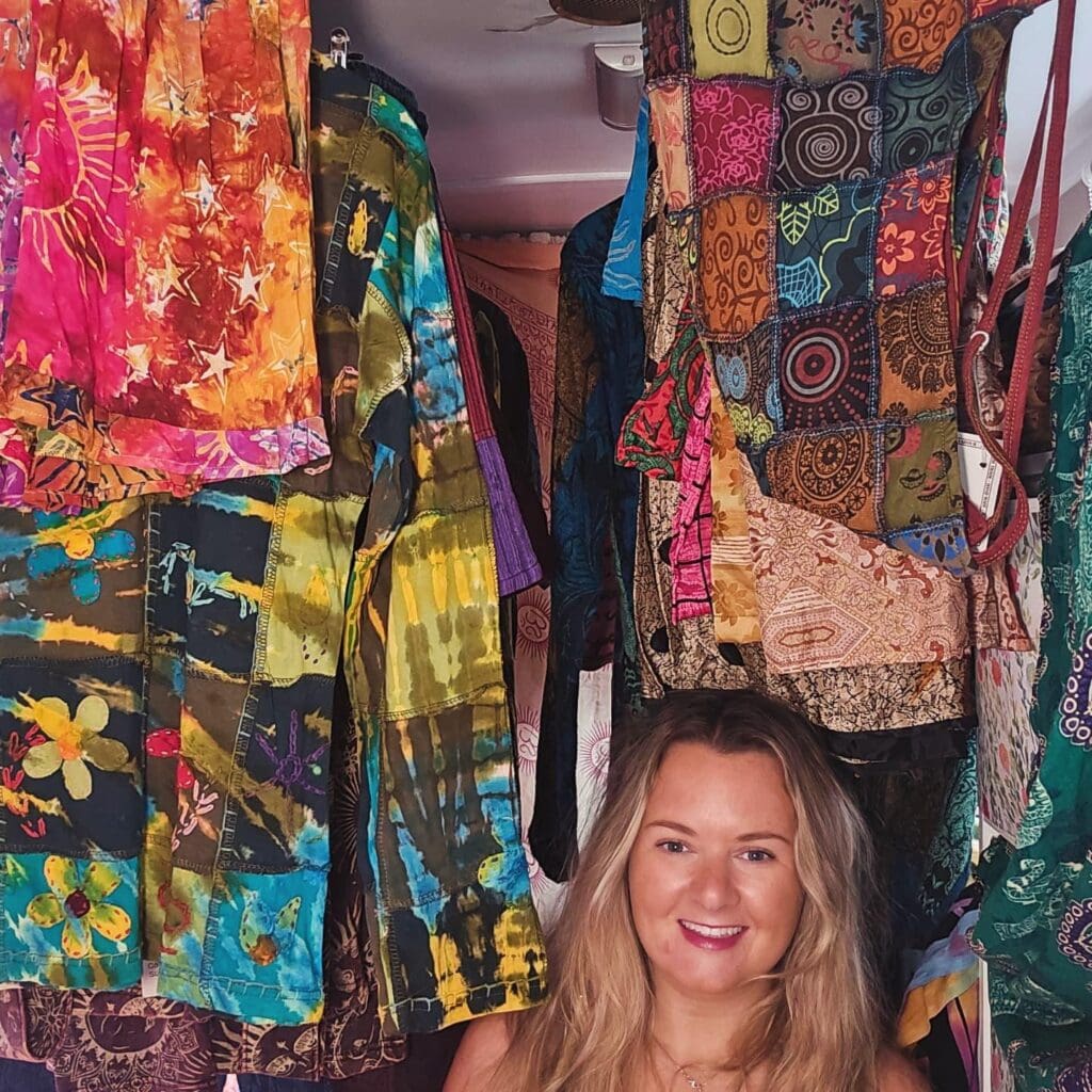 Deaine in her favourite room of the boat, filled with fair trade unique items. 
